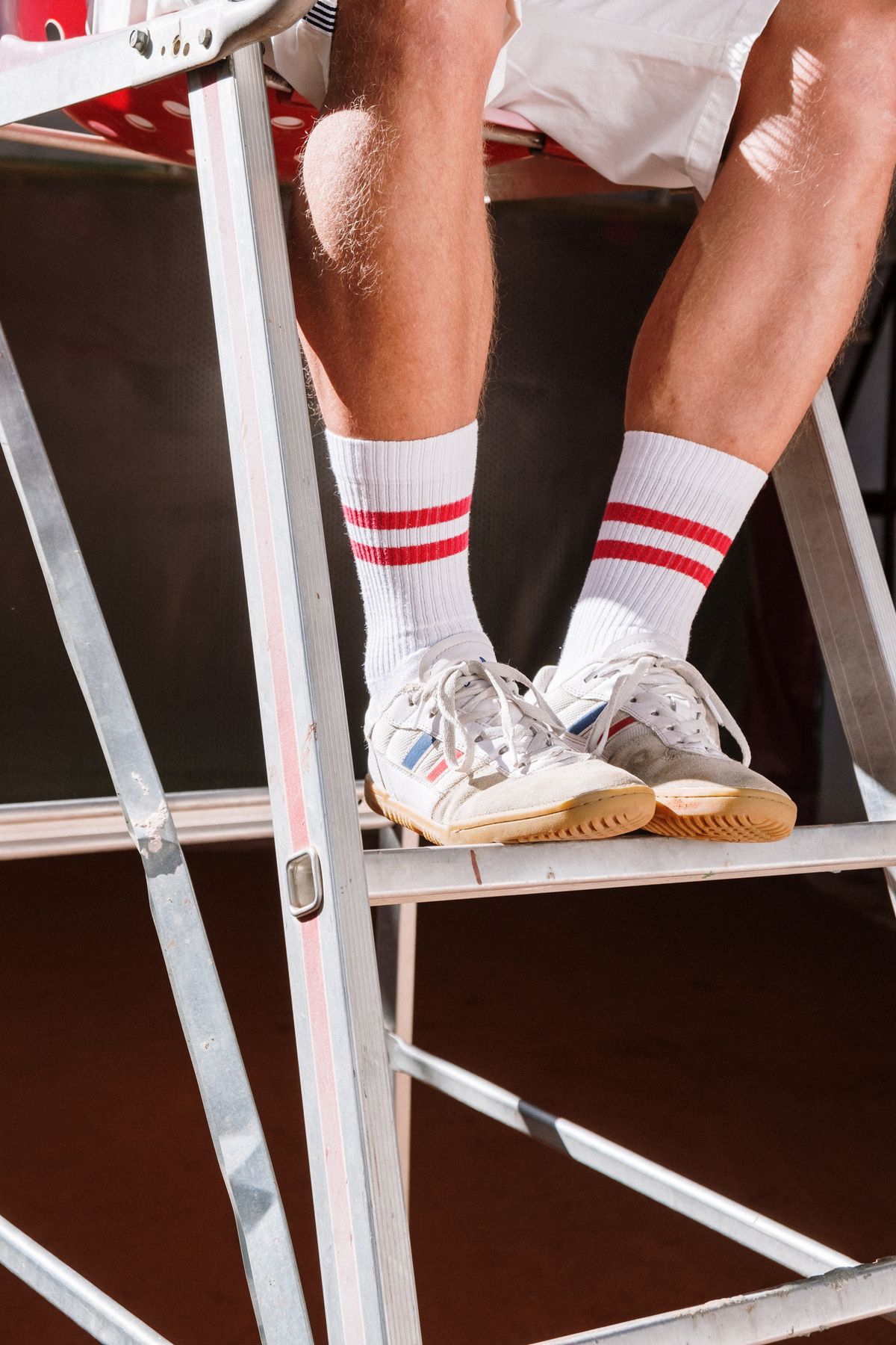 Lacing up running shoes before an easy run-walk session.