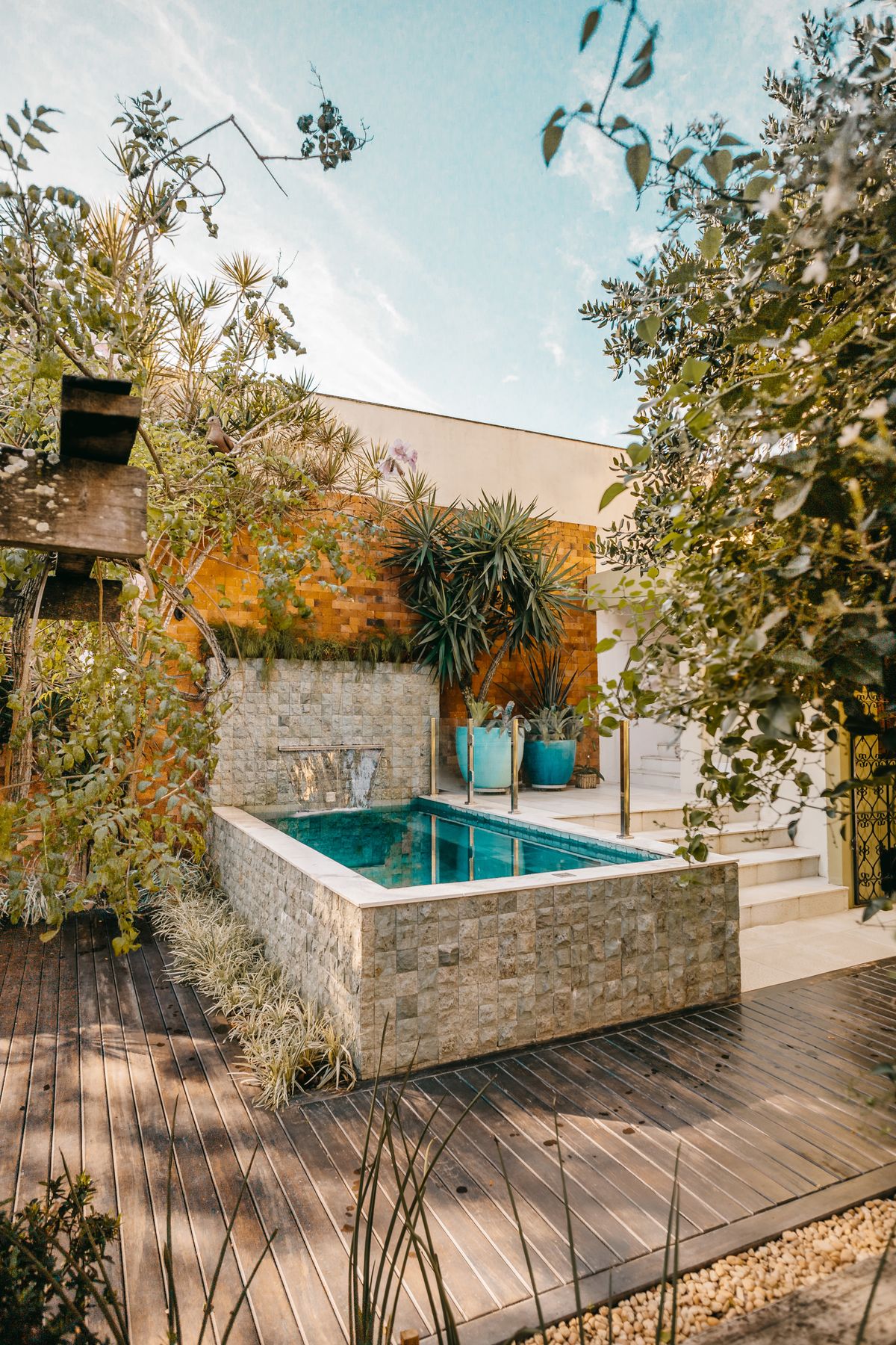 A tranquil backyard cold plunge setup.