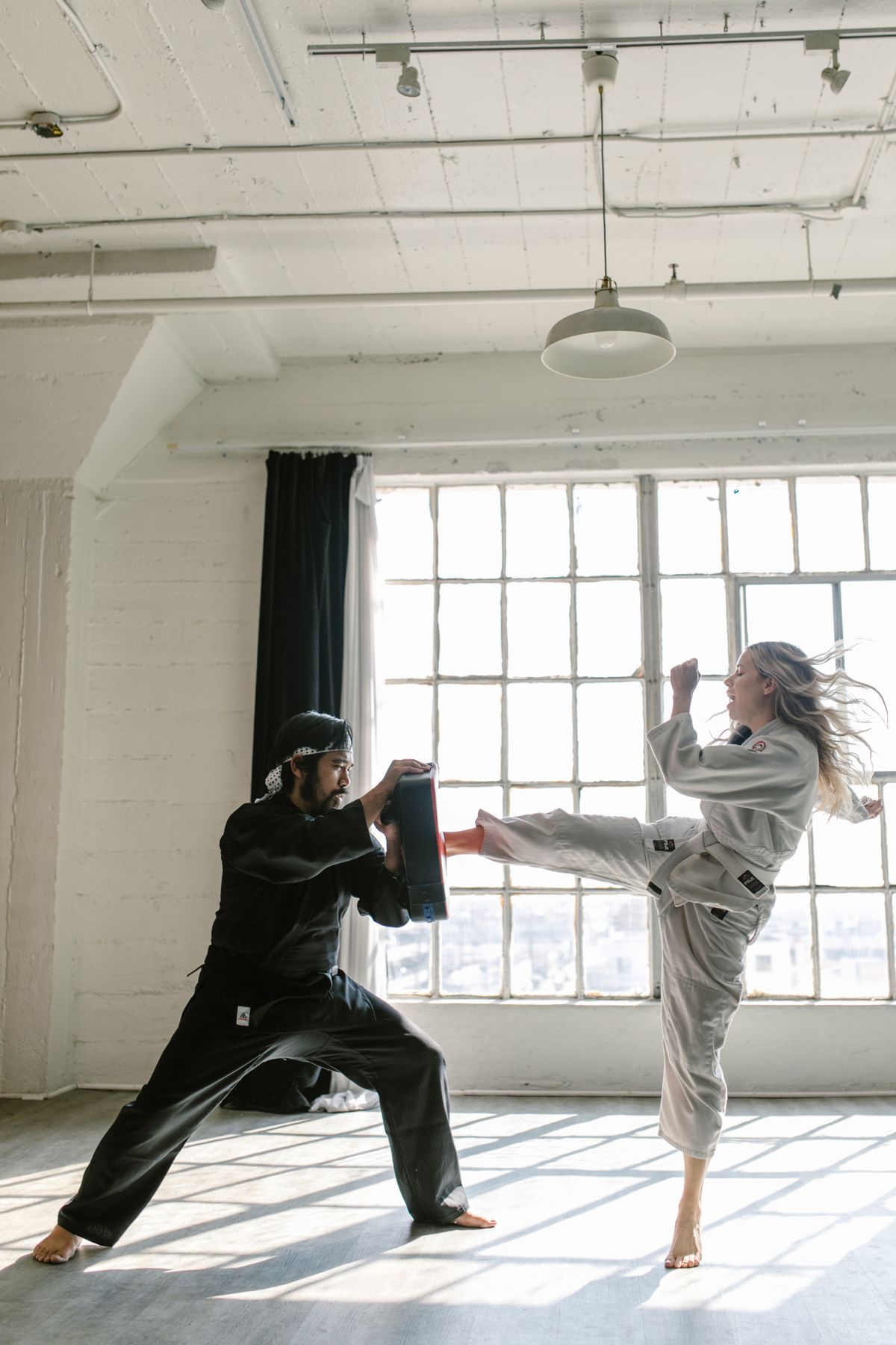 A person practising striking, martial arts you can start at any age.