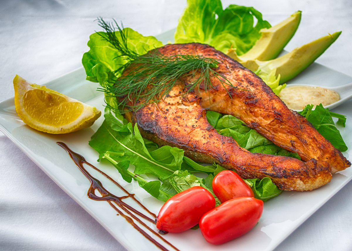 Grilled salmon, a complete whole-food protein source.