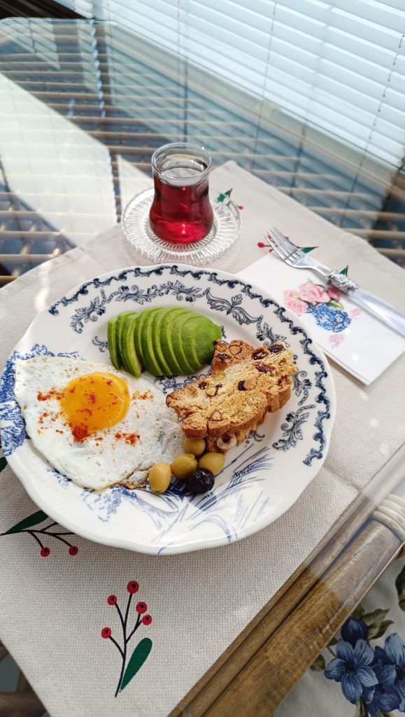 A balanced morning breakfast of egg, avocado and seeded toast