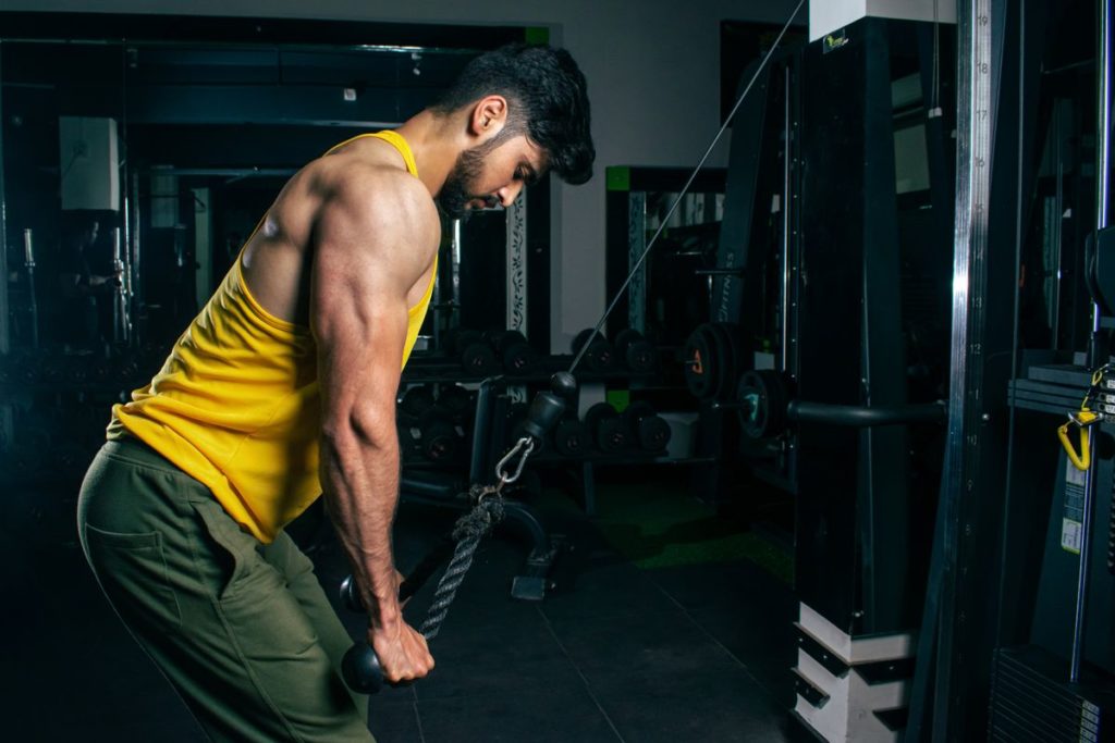 A person training with weights in a gym