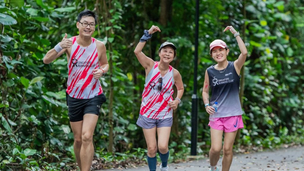 A small group of runners training outdoors